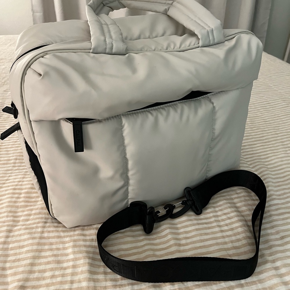 Calpak White and Black Padded Travel Bag